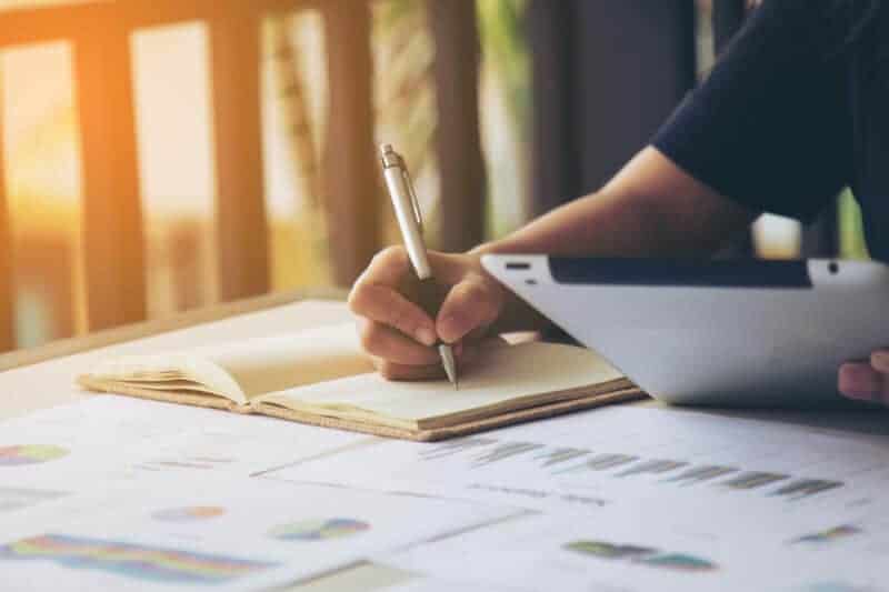 Business woman signing a document
