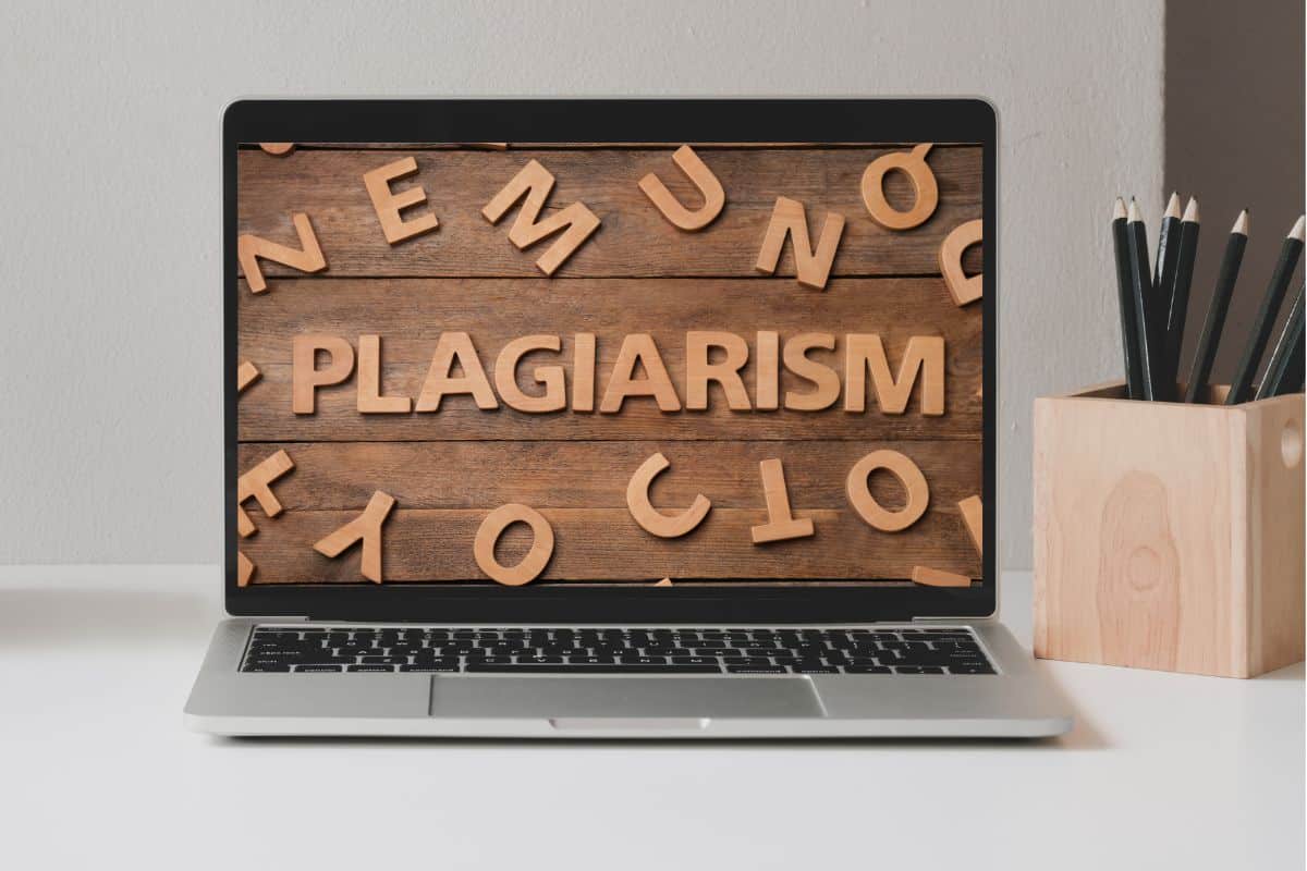 Laptop with a "Plagiarism" word displayed on the screen