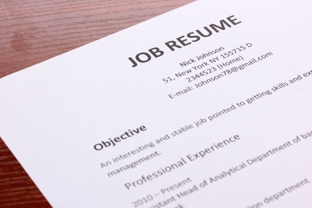 Closeup of resume on wooden table
