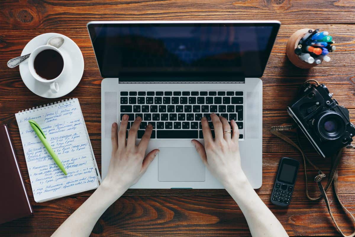 Top view of a woman working at a laptop