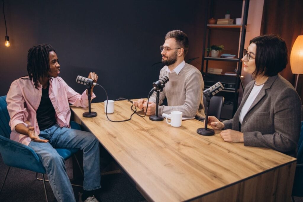 What Is a Panel Interview? Questions & Winning Answers 4 Professional radio team interviewing guest
