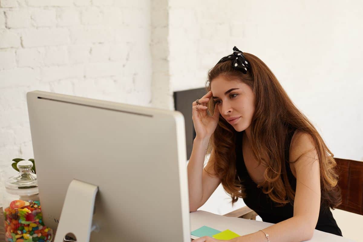 Portrait of caucasian female economist is analyzing the activities
