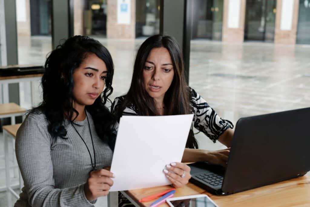 Businesswomen working with their laptops in an office