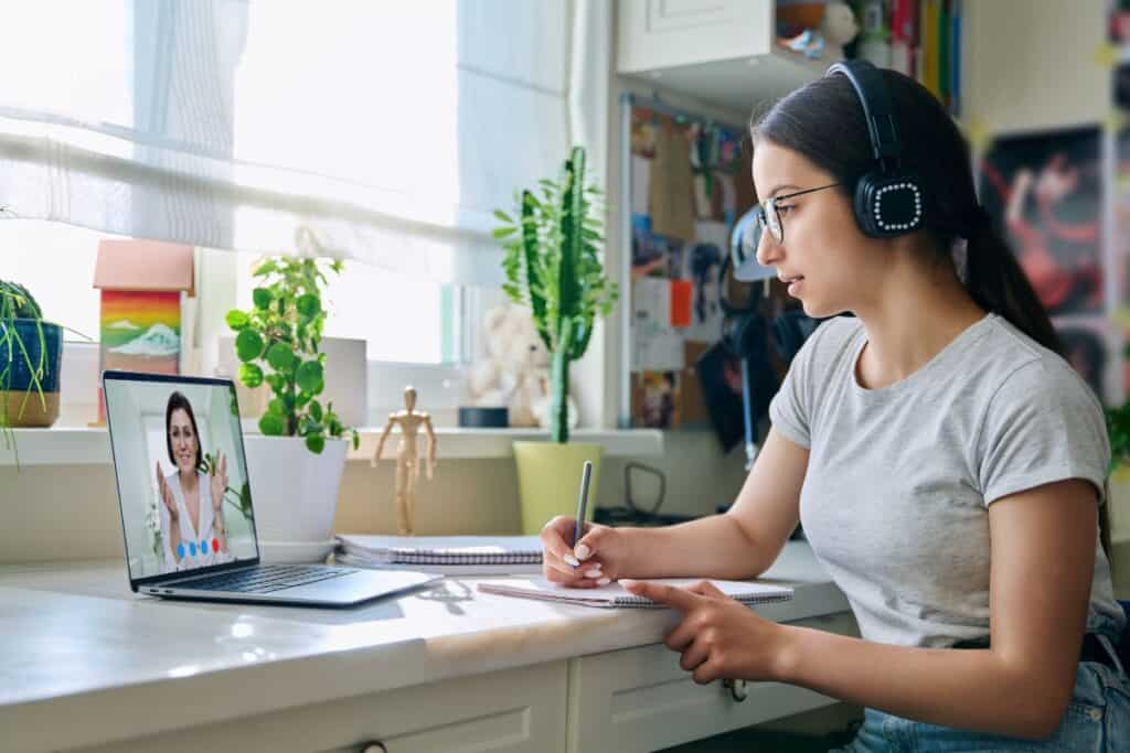 Online consultation of female student by social worker psychologist teacher