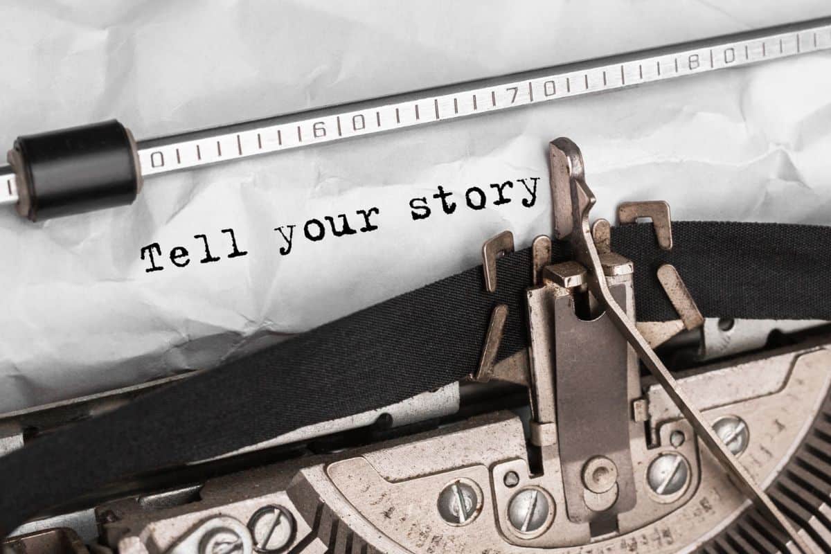 Text tell your story typed on retro typewriter