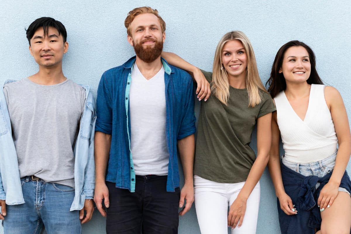 Stock image of a group of men and women gathered together
