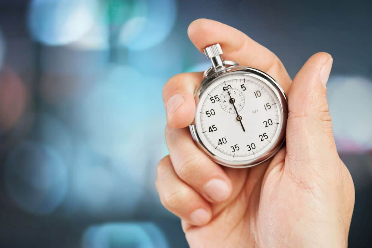 Close-up stopwatch in human hand