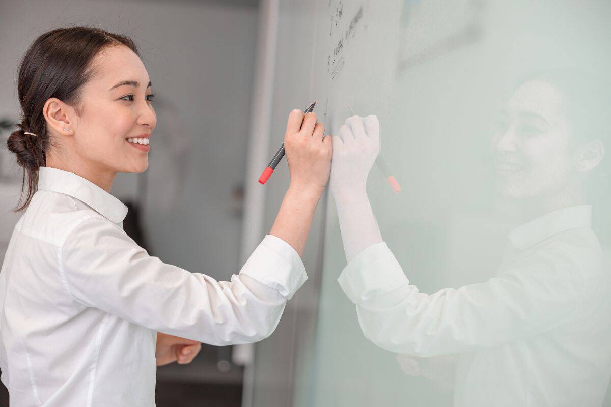 Asian woman working in it office