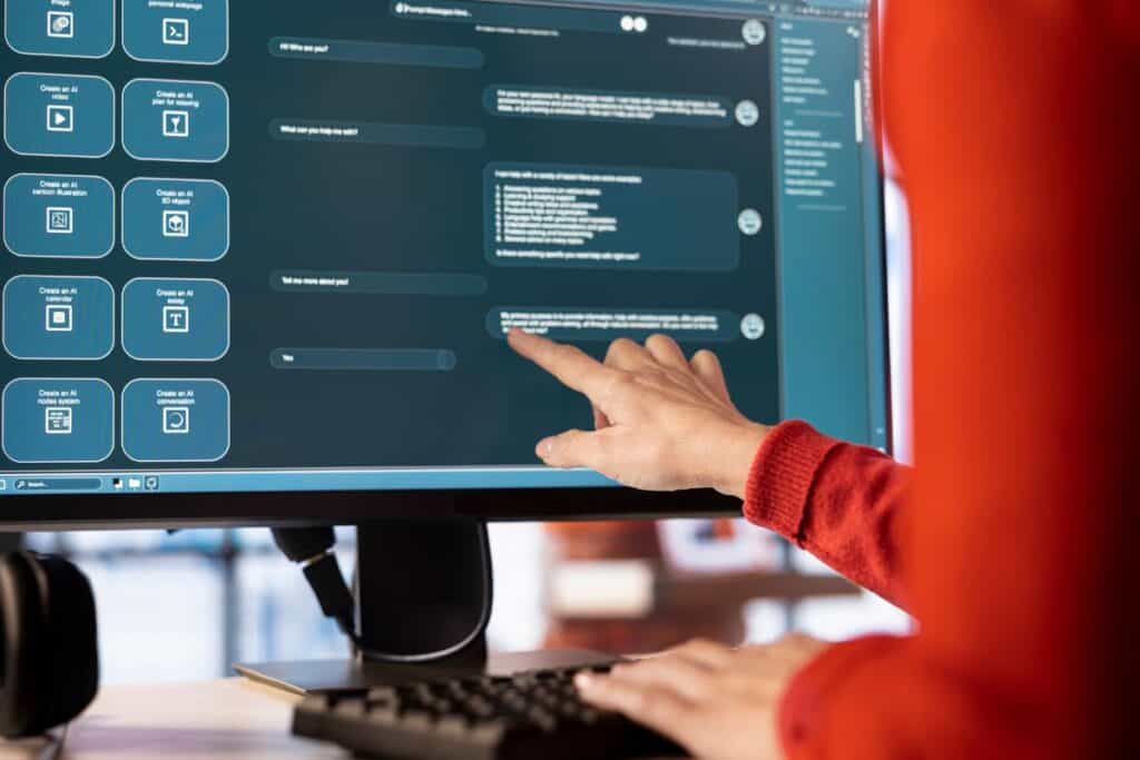 Woman uses ai chatbot system on a computer to guide her through tasks