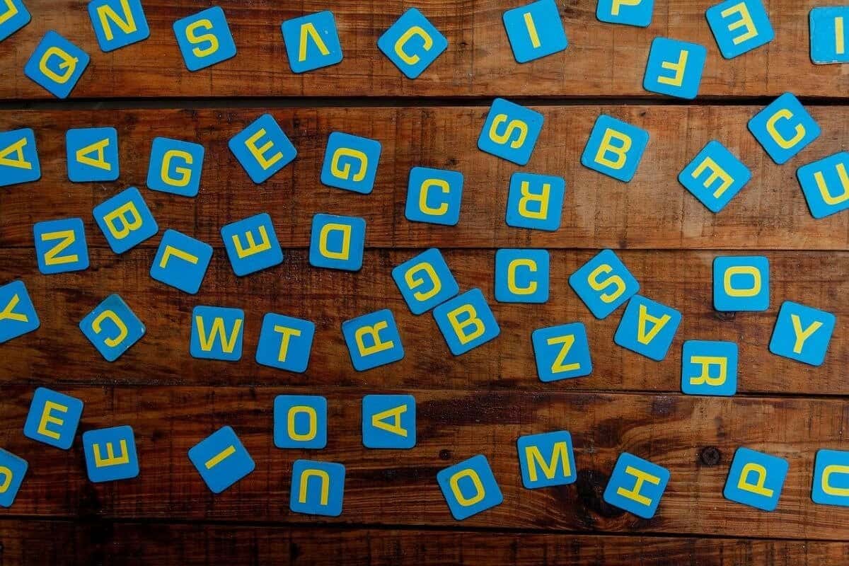 Jumbled scrabbled letters scattered randomly