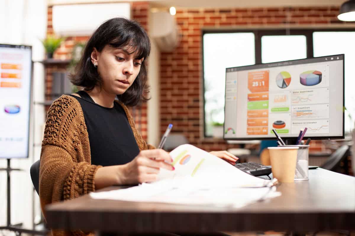 Female manager reviewing documents