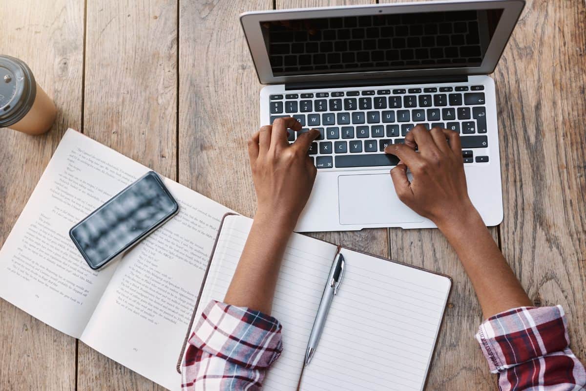 Woman hands and laptop of student