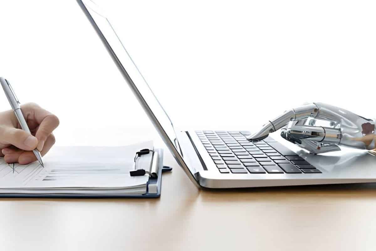 robot working on a laptop