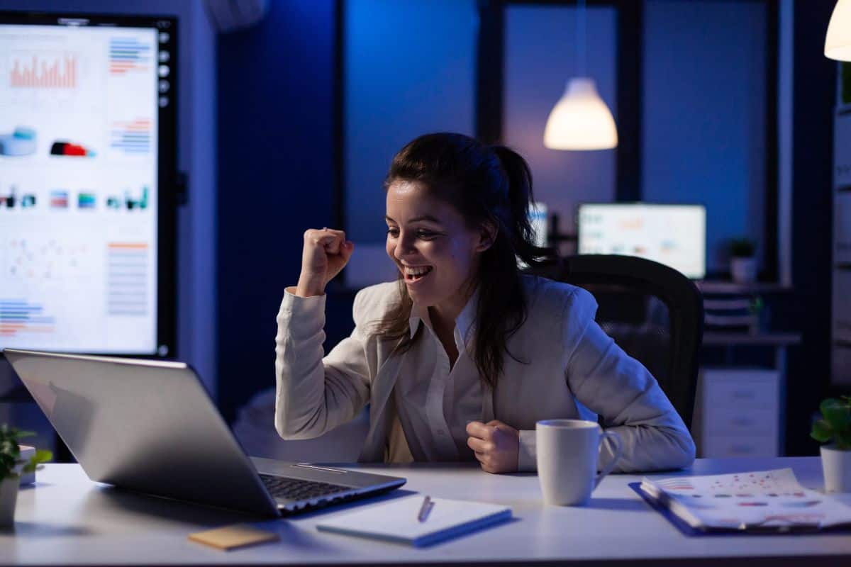 businesswoman checking profit resultes standing in business office