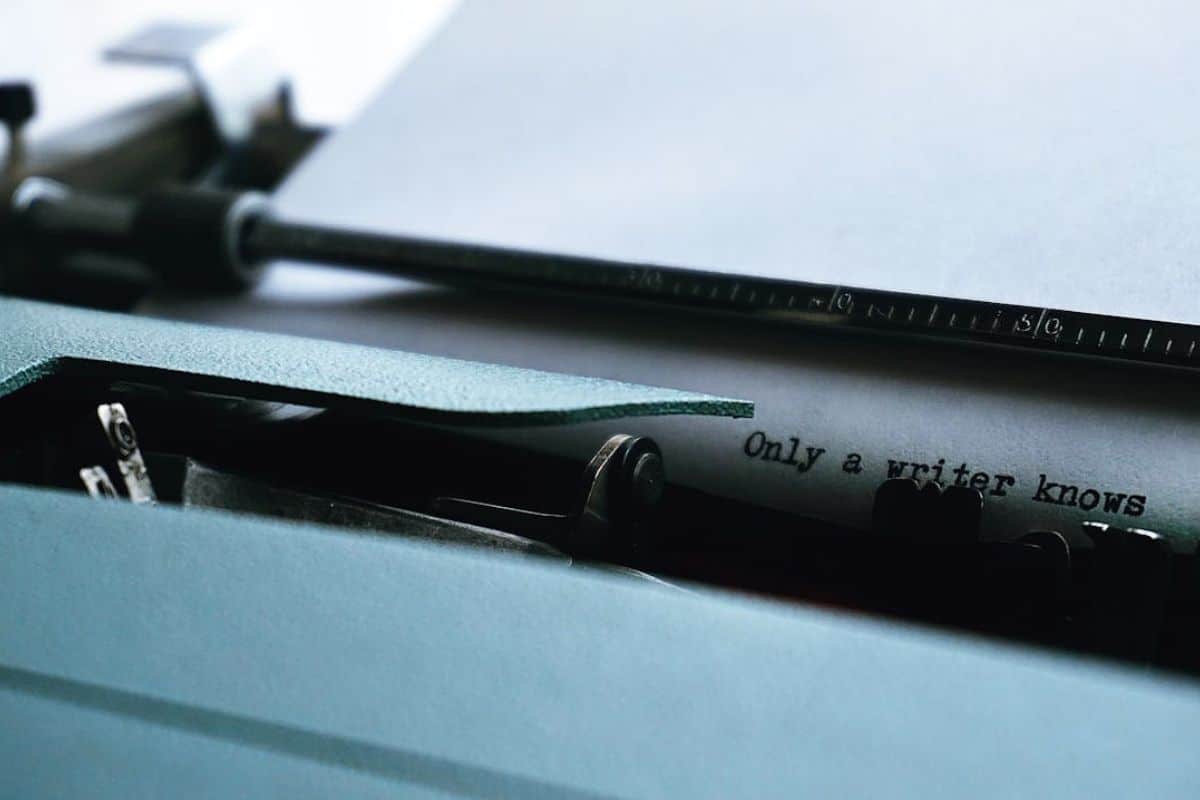 Close-up Photography of Typewriter With Only a Writer Knows Text on Printer Paper