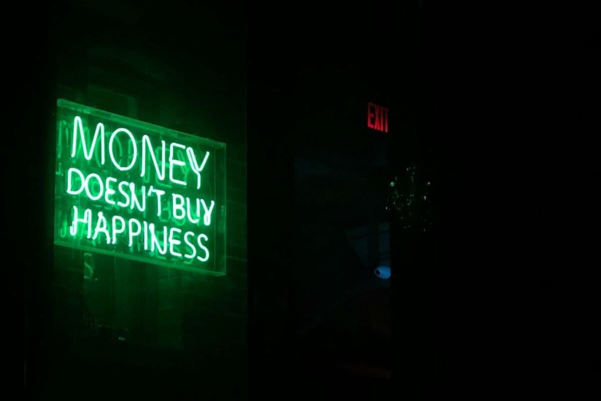 money doesn't buy happiness image at the bar