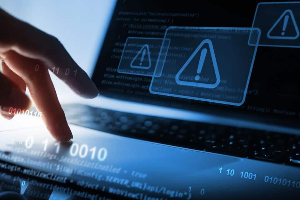 Cyber security concept man using computer with system hacked 