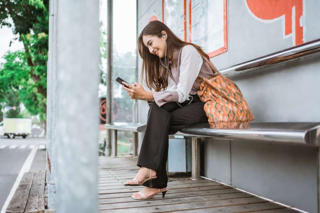 Business woman on a bus station