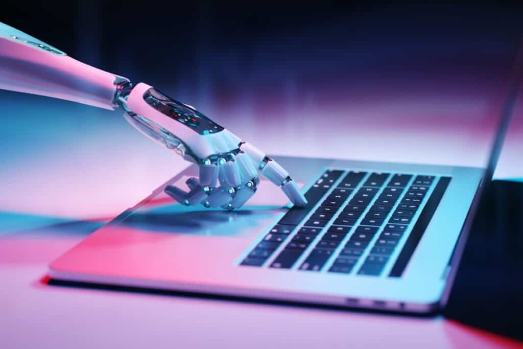 Robotic hand pressing a keyboard on a laptop 3d rendering